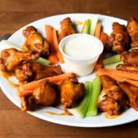 Wings · Served with Bleu cheese or ranch dressing, carrots and celery.