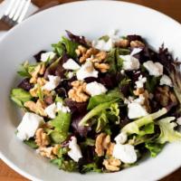 Roasted Beet Salad · Mixed greens, roasted beets, walnuts, goat cheese, balsamic vinaigrette dressing.