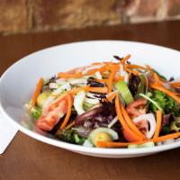 Garden Salad · Mixed greens, cucumbers, carrots, tomatoes, onions, red wine vinaigrette dressing.