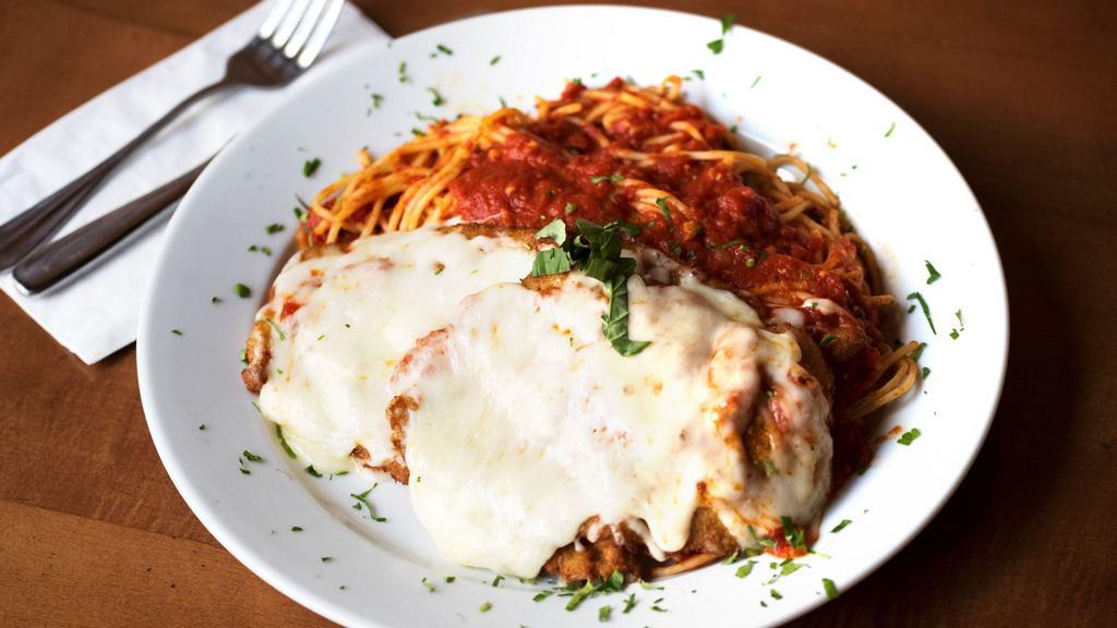 Chicken Parmigiana · Breaded chicken cutlet, baked with our tomato sauce and Mozzarella cheese.