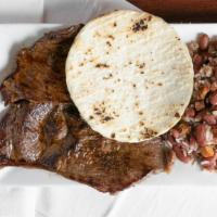 Calentado Con Arepa Y Carne Asada  · Corn Cake, Rice and Beans with Grilled Beef