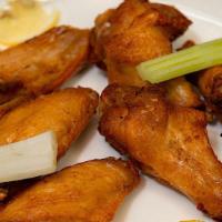 Wings (75 Pcs) · Your choice of 4 flavors. Blue cheese or ranch dressing.