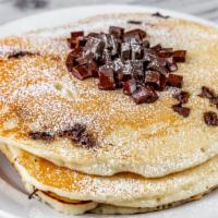 Maple Butter Pancakes · Choice of blueberry, chocolate chunk, or plain. *No Modifications or Special Requests Allowe...