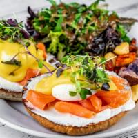 Eggs Benny · Poached eggs & hollandaise with your choice of protein on herb bun, served with home fries a...
