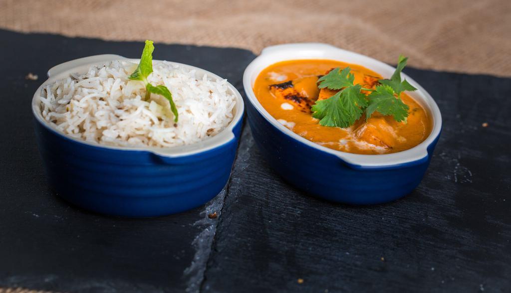 Butter Chicken · Chicken cooked with spices, herbs and rich buttery sauce.