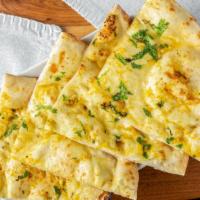 Garlic Naan · Favorite. Bread topped with fresh chopped garlic.