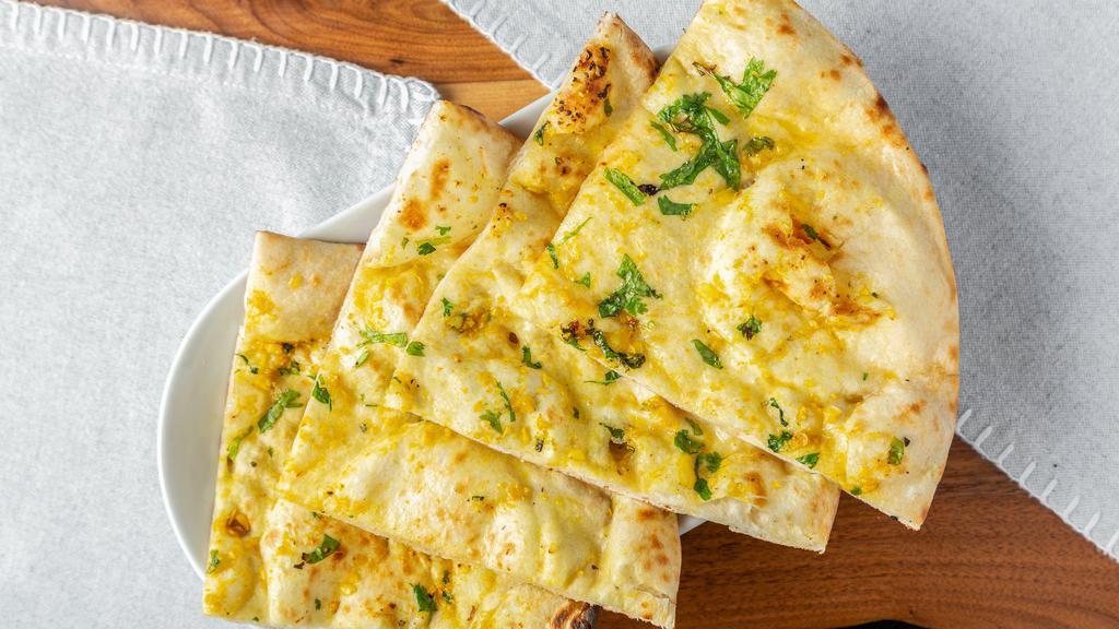 Garlic Naan · Favorite. Bread topped with fresh chopped garlic.