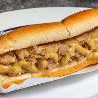 Van Vorst Hot Dog · Two natural casing Sabrett hot dogs topped with sauerkraut and spicy brown mustard.