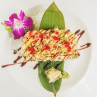 Super Volcano Roll · (Cooked) California roll topped with king crab salmon scallop & white fish mayo tobiko scall...