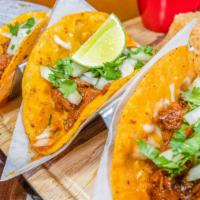 Birria Tacos* · Three soft corn tortilla with beef stew seasoned with chili pepper, melted cheese, cilantro ...