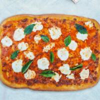 Queen Mergherita Vegan Pizza · Dive into our classic vegan 14' rectangle Sicilian pizza margherita pie. This Take a bite of...