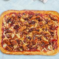 Vegan Bbq Bliss Pizza · Vegan BBQ topped on a vegan 14' rectangle Sicilian pizza with homemade tomato sauce, vegan c...