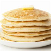 Original Pancakes · Fluffy pancakes served with a side of butter and syrup.