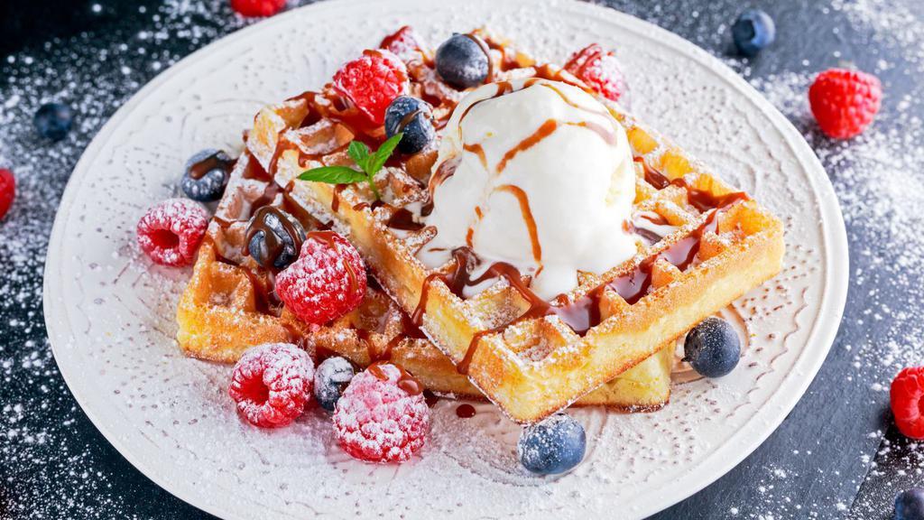 Original Belgian Waffles · Made from scratch upon demand, served with powdered sugar, butter, and syrup.