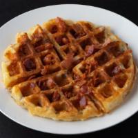 Belgian Waffles With Bacon · Made from scratch upon demand, served with powdered sugar, butter, and syrup.