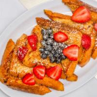 Texas French Toast · Add strawberry, banana, blueberry, chocolate chips, Nutella for an additional charge.
