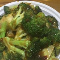 Sautéed Broccoli · With jasmine rice.