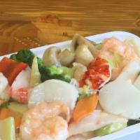 Seafood Delight · Jumbo shrimp, scallop, crabmeat, and lobster meat sautéed with mixed vegetables in light win...