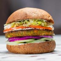 Athens Veggie Burger · The original veggie patty, feta cheese, lettuce, cucumbers, tomato, and tzatziki sauce on a ...