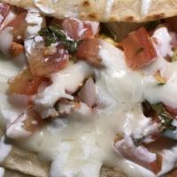 Gorditas Mexicanas / 2. Mexican Gorditas · Pollo o res, lechuga, queso fresco, crema, pico de gallo, jalapeño. / Thick tortilla stuffed...