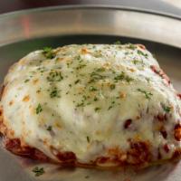 Lasagna Pizza · Ground beef w/ Ricotta, Fresh Tomato Sauce & Mozzarella.