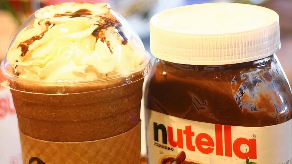 Iced Nutella Latte · Espresso blended with Nutella poured over iced cold milk, topped with whipped cream.