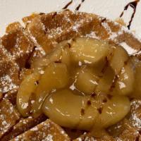 Apple Caramel Waffle · Filled with apples and caramel bites. Topped with apples and powdered sugar, drizzled with c...