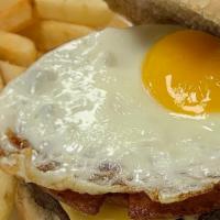 Jersey Burger Deluxe · Sirloin burger, two-piece of Taylor ham, American cheese and sunny side up egg. Served with ...