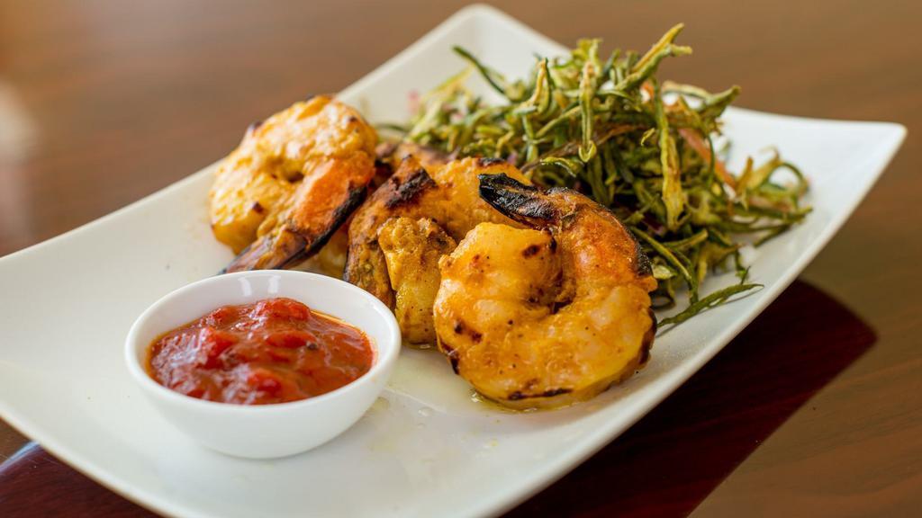 Grilled Shrimp · Jumbo shrimp marinated in fresh herbs and spices.