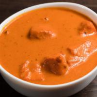 Chicken Tikka Masala · Tender chicken pieces are marinated, then finished in fenugreek flavored tomato sauce and cr...