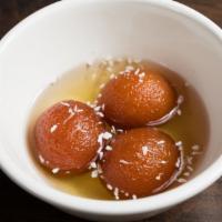 Gulab Jamun · Sweet, deep-fried cheese ball in honey syrup.