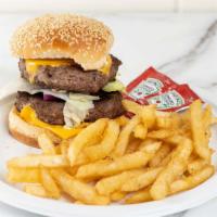 Double Cheeseburger · Double Patties & Cheese, Onion, Lettuce, Tom, Mayo or Ketchup with Fries.