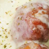 Meatball Parm · Hot meatballs, melted mozzarella, with marinara sauce.