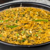 Methi Malai Matar · Chef's special dish it combines fresh Fenugreek leaves with green peas and grated paneer in ...