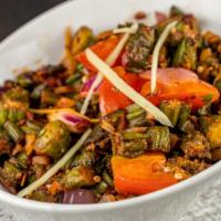 Bhindi Masala · Okra Cooked with onion and tomatoes, seasoned with aromatic herbs - Vegan
