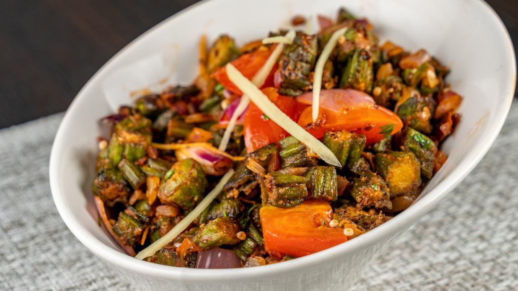 Bhindi Masala · Okra Cooked with onion and tomatoes, seasoned with aromatic herbs - Vegan