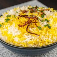 Hyderabadi Veg Biryani · Long grain basmati rice cooked with fresh vegetables and a blend of spices