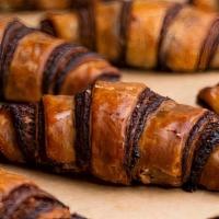 Rugelach · Soft, flakey, mini croissant shaped chocolate rugelach. (contains dairy and nuts)