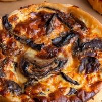 Mushroom Quiche · Flaky savory tart with mushrooms, onion, and gouda cheese.
