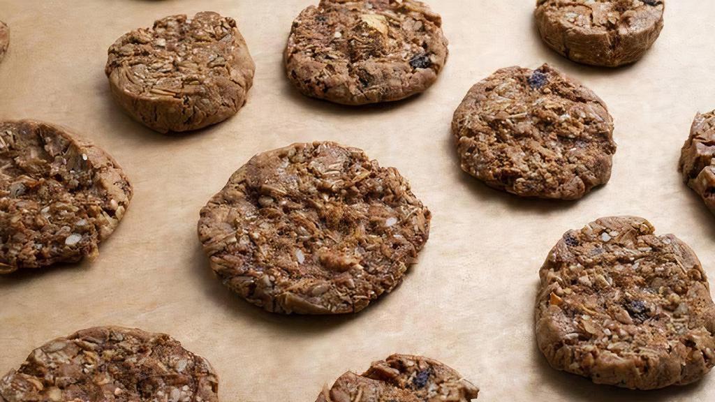 Granola Cookies · Crunchy cookies packed with house-made granola, dried fruit, seeds, grains, walnuts and coconut.