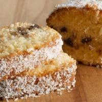 Coconut Chocolate Chip Cake · Tender flourless coconut cake with dark chocolate chips.