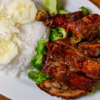 Jerk Chicken With Broccoli · With white rice.