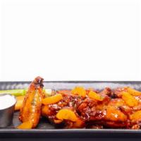 12  Chicken Wings · Crispy chicken wings tossed in our signature tap room hot sauce and served with celery. Carr...