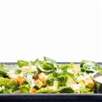 Classic Caesar · Baby romaine tossed in a classic Caesar dressing topped with garlic and herb croutons and fr...