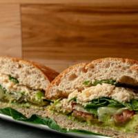 Vegan Torta · Pressed Mexican sandwich served on a wheat roll with vegan jack cheese, sliced avocado, pick...