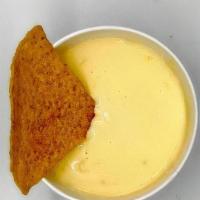 8 Oz Melted Queso And Chips · Tony's best Melted Cheese Sauce with Fresh corn Tortilla Chips
