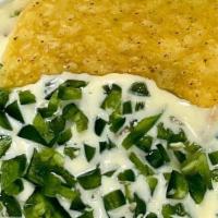 8Oz Jalapeño Queso W/Chips · Spicy Melted Cheese Deep served with Warm corn Tortillas