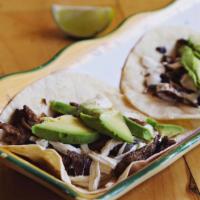 Taco Americanillos · With cheese, avocado, and choice of meat. pastor carnitas cuero oreja buche pollo bistec cho...