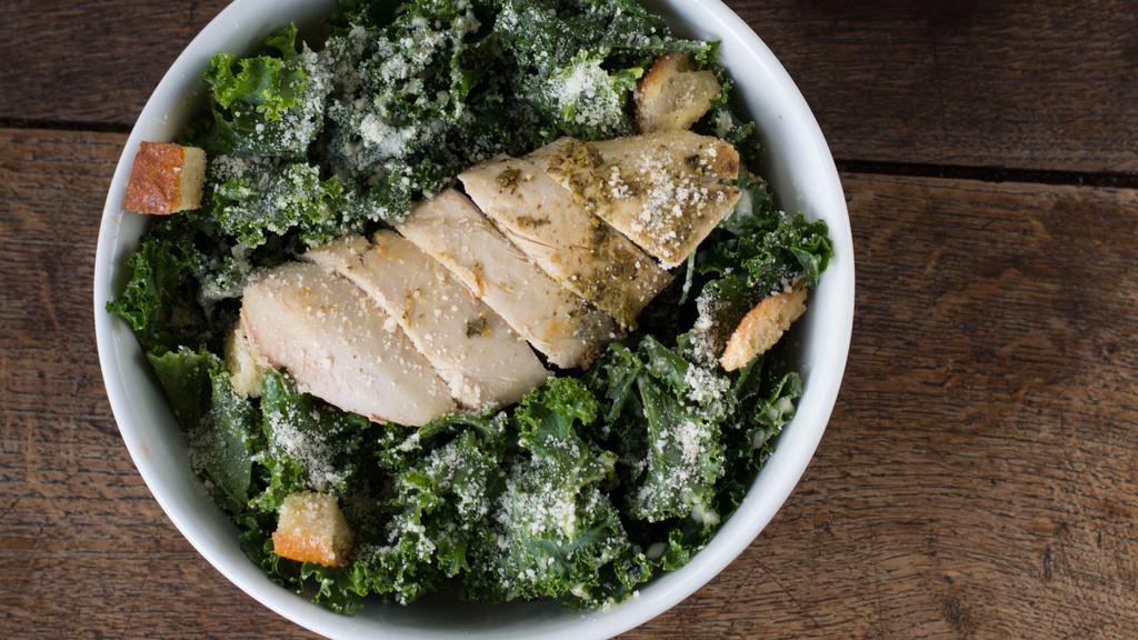 Kale Caesar Salad With Rotisserie Chicken · Parmesan, croutons, house made caesar dressing.