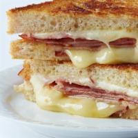 Ham And Cheese · Hormel ham , american cheese or mozzarella cheese, pullman sourdough or whole wheat